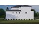 Side view of a modern two-story home with multiple windows at 2221 S Occident St, Tampa, FL 33629
