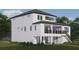 Back of the house, showcasing a balcony and two-car garage at 2221 S Occident St, Tampa, FL 33629