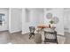 Bright home office space featuring a modern desk, stylish seating, and elegant decor for a productive workspace at 652 Allora Ave, Nokomis, FL 34275