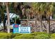 A Venice Beach welcome sign among palm trees, showcasing the park and recreation area at 652 Allora Ave, Nokomis, FL 34275