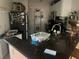 Kitchen with black appliances and granite countertops at 115 112Th Ne Ave # 605, St Petersburg, FL 33716
