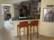Kitchen with breakfast bar and granite countertops at 115 112Th Ne Ave # 605, St Petersburg, FL 33716