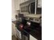 Kitchen with stove, microwave, and built-in oven at 115 112Th Ne Ave # 605, St Petersburg, FL 33716