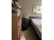Bedroom with double bed and bookcase at 115 112Th Ne Ave # 605, St Petersburg, FL 33716