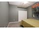 Bright bedroom with double closet and neutral decor at 239 147Th Ne St, Bradenton, FL 34212