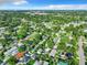 High aerial view of a dense suburban area with an abundance of mature trees at 3128 17Th N St, St Petersburg, FL 33713