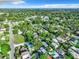 Expansive aerial view of a residential neighborhood featuring lush greenery and beautiful homes at 3128 17Th N St, St Petersburg, FL 33713