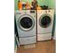 Laundry room with LG washer and dryer, and additional storage at 3464 Silverstone Ct, Plant City, FL 33566