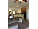 Open living room with a view of the kitchen and a comfortable sectional sofa at 3464 Silverstone Ct, Plant City, FL 33566
