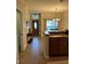 Bright kitchen with an island and access to dining area at 3464 Silverstone Ct, Plant City, FL 33566