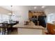 Kitchen boasts a breakfast bar, ample cabinetry, and modern appliances at 3464 Silverstone Ct, Plant City, FL 33566