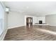 Spacious living room featuring a stone fireplace and wood-look floors at 3128 17Th N St, St Petersburg, FL 33713