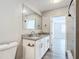 Bathroom with double vanity and granite countertop at 3128 17Th N St, St Petersburg, FL 33713