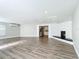 Spacious living area with hardwood floors and a stone fireplace at 3128 17Th N St, St Petersburg, FL 33713