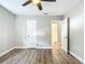 Well-lit bedroom with wood-like floors and double closets at 3128 17Th N St, St Petersburg, FL 33713
