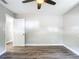 Spacious bedroom with wood-look floors and ceiling fan at 3128 17Th N St, St Petersburg, FL 33713