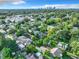 Wide aerial view of neighborhood with city skyline in the distance at 3128 17Th N St, St Petersburg, FL 33713