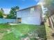 House with backyard, covered patio, and wooden fence at 3128 17Th N St, St Petersburg, FL 33713