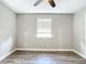 Spacious bedroom with wood-look floors and window blinds at 3128 17Th N St, St Petersburg, FL 33713