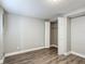 Spacious bedroom with grey walls, wood-look floors and a large closet at 3128 17Th N St, St Petersburg, FL 33713