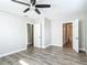 Bedroom with ensuite bathroom and wood-look floors at 3128 17Th N St, St Petersburg, FL 33713