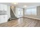 Open living area with stairs and French doors at 3128 17Th N St, St Petersburg, FL 33713