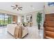 Spacious living room with a neutral color palette and hardwood floors at 2847 Tarragona Way, Wesley Chapel, FL 33543