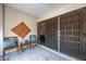 Cozy front porch with seating, creating a warm and inviting entrance to the home at 3744 E Lake Dr, Land O Lakes, FL 34639