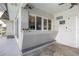 This home offers a brick outdoor kitchen and bar area at 3744 E Lake Dr, Land O Lakes, FL 34639