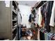 Organized walk-in closet with shelving and hanging space, maximizing storage at 3744 E Lake Dr, Land O Lakes, FL 34639