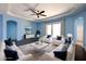 Light and airy living room with white sofas and a coffee table at 4212 Wildstar Cir, Wesley Chapel, FL 33544