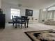 Bright dining room with chandelier and seating area at 1324 Maximilian Dr, Wesley Chapel, FL 33543