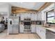 Kitchen with stainless steel appliances and granite countertops at 455 Lenoir Nw St, Port Charlotte, FL 33948