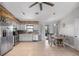 Modern kitchen with stainless steel appliances and a wood accent wall at 455 Lenoir Nw St, Port Charlotte, FL 33948