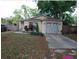 Charming single story home with attached garage and landscaped yard at 4605 N 39Th St # 1/2, Tampa, FL 33610