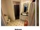 A bathroom with a shower, toilet and vanity at 4605 N 39Th St # 1/2, Tampa, FL 33610