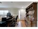 Bright home office features built-in cabinetry and hardwood floors at 636 Yardarm Dr # 636, Apollo Beach, FL 33572