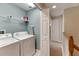 Laundry room with washer, dryer, and shelving at 636 Yardarm Dr # 636, Apollo Beach, FL 33572