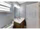 Guest bathroom with single sink and toilet at 636 Yardarm Dr # 636, Apollo Beach, FL 33572
