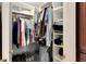 Well-organized walk-in closet with ample shelving and hanging space at 636 Yardarm Dr # 636, Apollo Beach, FL 33572