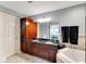 Elegant bathroom with double vanity, soaking tub, and walk-in shower at 636 Yardarm Dr # 636, Apollo Beach, FL 33572