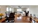 Spacious living room with hardwood floors, sectional sofa, and ceiling fan at 636 Yardarm Dr # 636, Apollo Beach, FL 33572