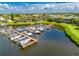 Boat docks with many boats in a waterfront community at 636 Yardarm Dr # 636, Apollo Beach, FL 33572