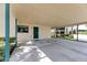 Covered carport with access to the home at 636 Yardarm Dr # 636, Apollo Beach, FL 33572