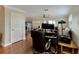 Home office with hardwood floors and a view into the living room at 636 Yardarm Dr # 636, Apollo Beach, FL 33572