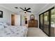 Spacious main bedroom with water views and ceiling fan at 636 Yardarm Dr # 636, Apollo Beach, FL 33572