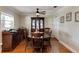 Bright dining room with hardwood floors and a built-in hutch at 636 Yardarm Dr # 636, Apollo Beach, FL 33572