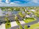 Aerial view of a waterfront community with lush landscaping at 636 Yardarm Dr # 636, Apollo Beach, FL 33572