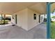 Exterior view of condo building with lush landscaping and palm trees at 636 Yardarm Dr # 636, Apollo Beach, FL 33572