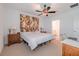 Large main bedroom with a comfortable bed and plenty of space at 17231 Holly Well Ave, Wimauma, FL 33598